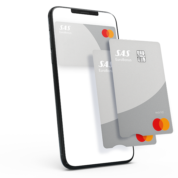 Två SAS EuroBonus-kreditkort visas framför en mobiltelefon